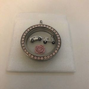 Pink locket with charms